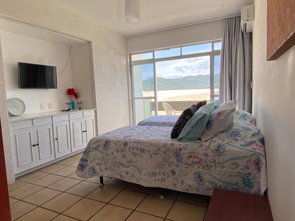 Pousada Das Dunas Via Praia Apart Hotel Florianópolis الغرفة الصورة